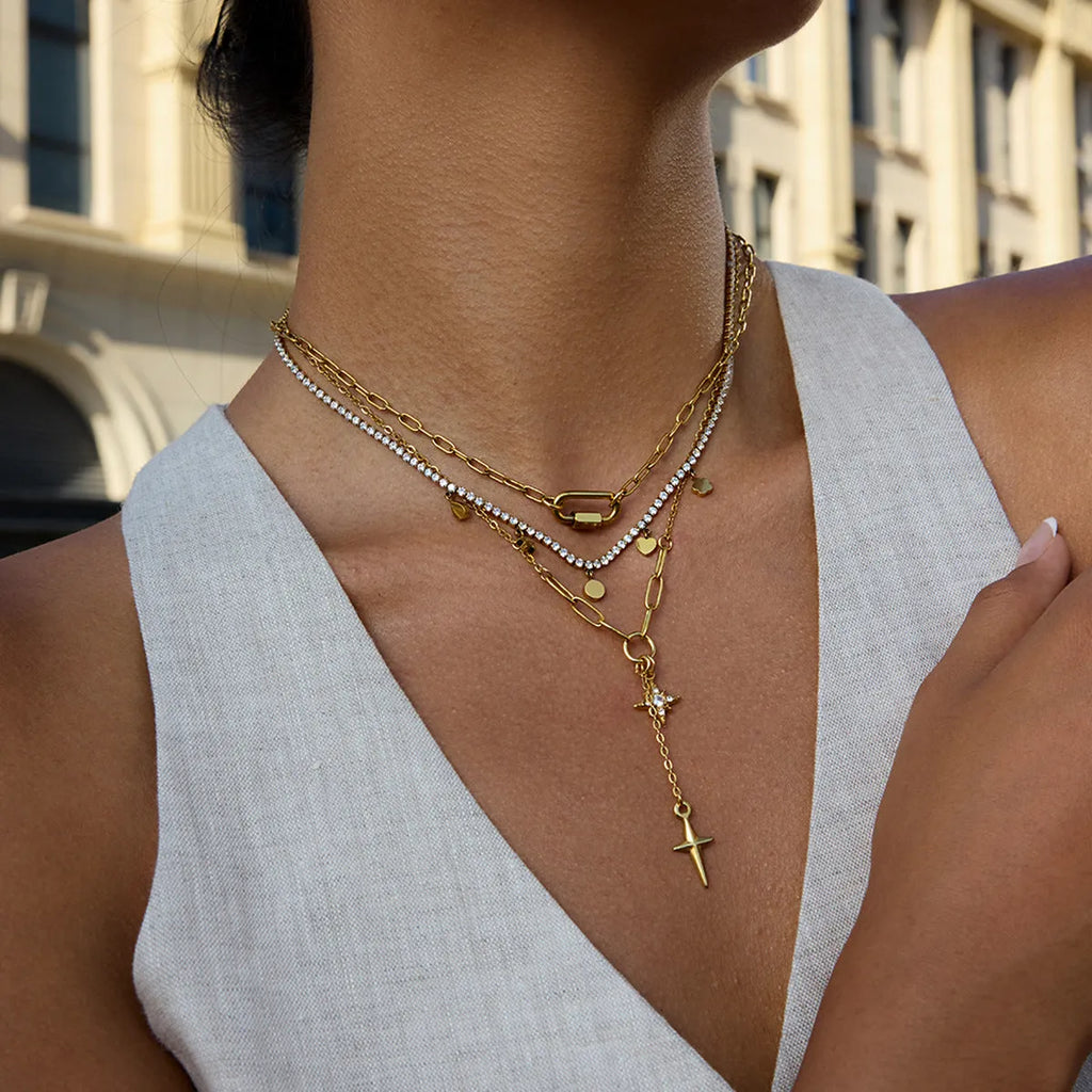 Classic 18K gold stainless steel necklace with white diamond eight-pointed stars on a regular chain
