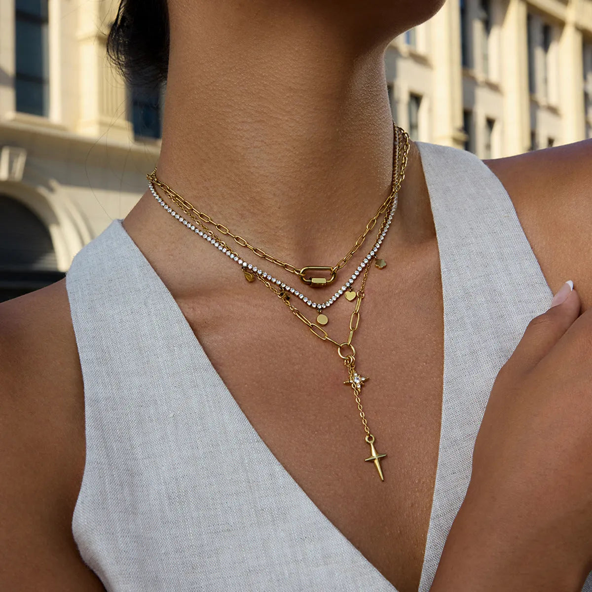 Classic 18K gold stainless steel necklace with white diamond eight-pointed stars on a regular chain
