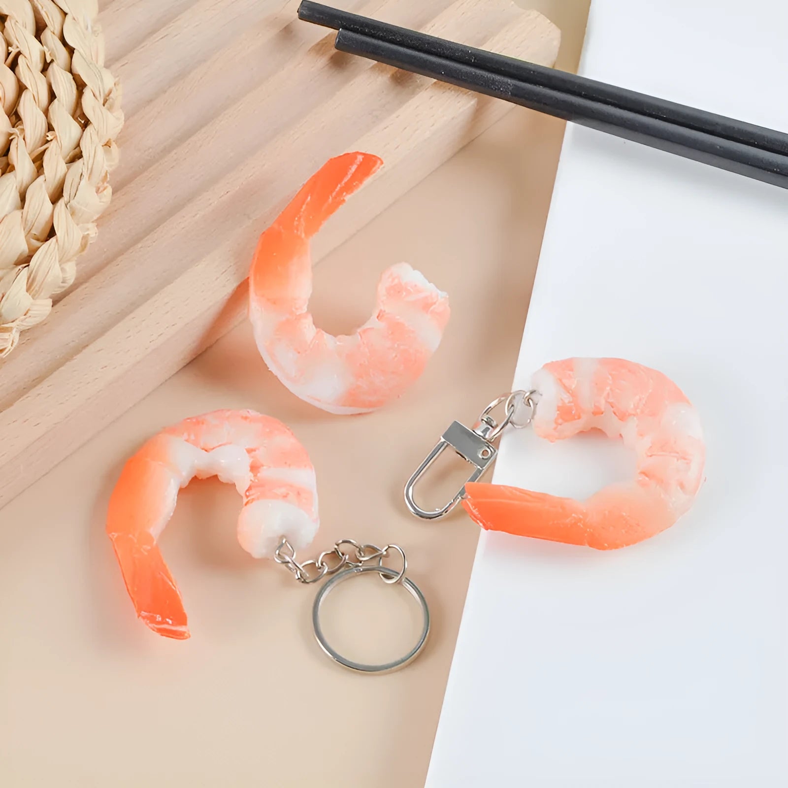 Detailed PVC simulation shrimp keychain bag charm on a white background.