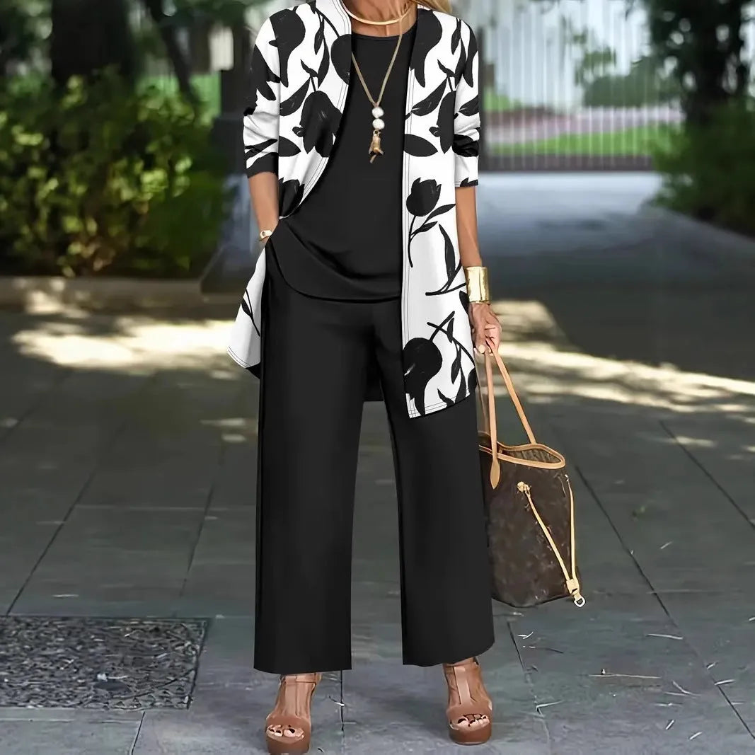 Women's printed three-piece casual suit set in polyester, showing jacket, vest, and trousers.