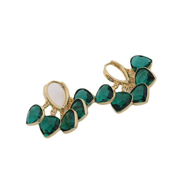 Green heart-shaped ear clip earrings with dancing shade design and artificial gemstones