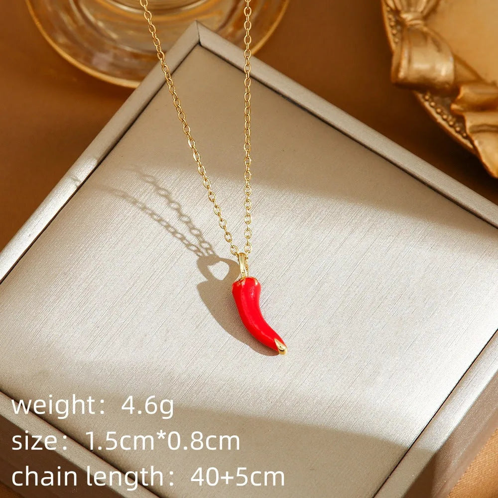 Delicate titanium steel necklace with a small cherry charm on an O-ring chain.