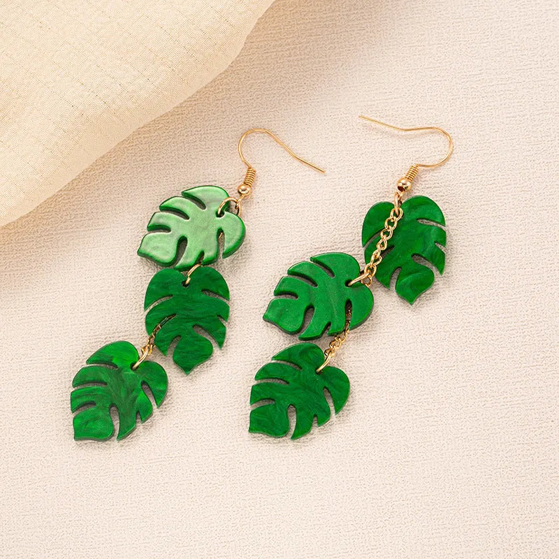 Alloy hook earrings with a blue acrylic jackfruit-shaped drop pendant.