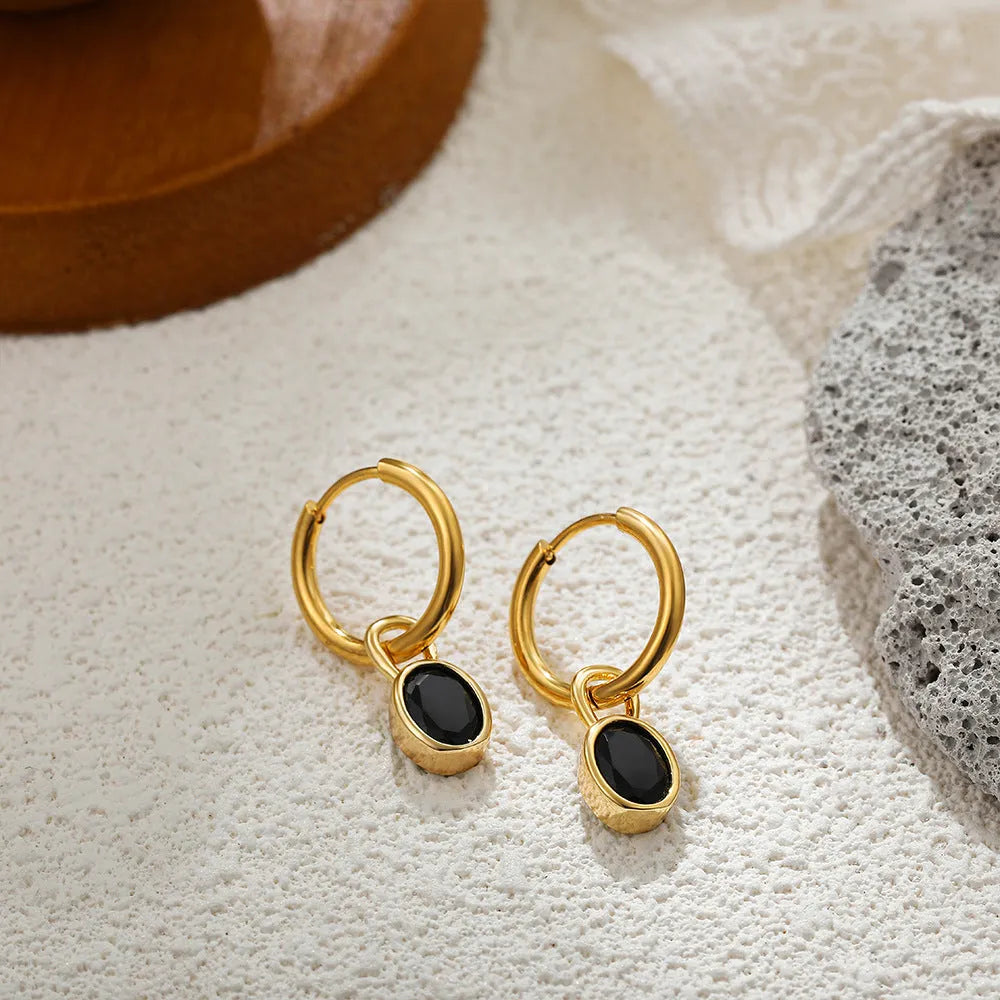 Women's retro oval zircon earrings in copper showing elliptical design