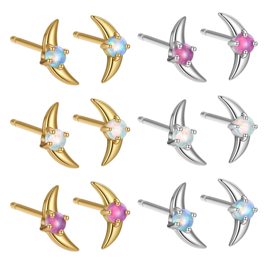 A pair of women's geometric earrings in 925 silver with a blue stone and gold electroplated finish.