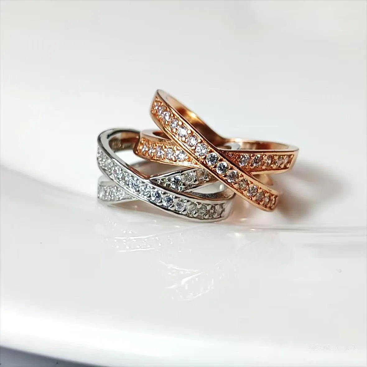 Metal cross ring with micro-inlaid zircon detailing in silver or rose gold electroplate finish