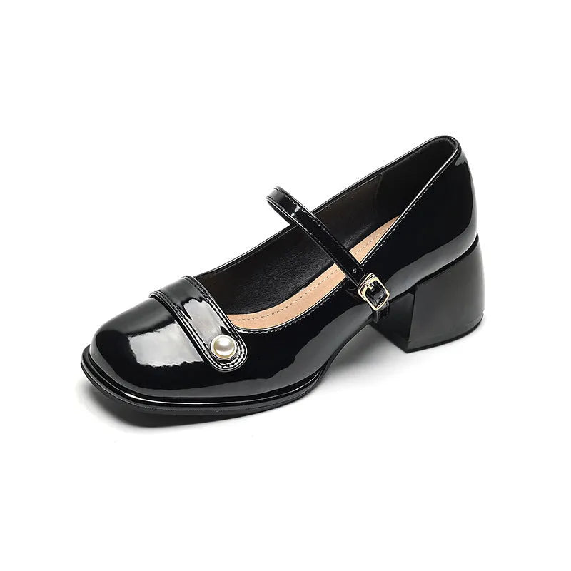 Plus size women's chunky heel pumps in patent leather with a square toe and front buckle, shown in apricot colour.
