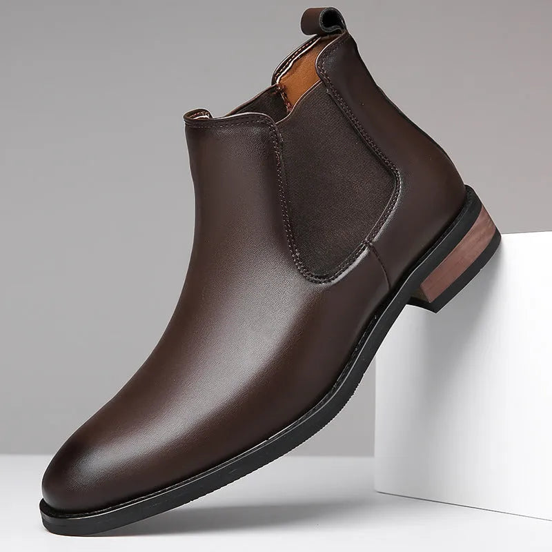 Men's black pointed toe Chelsea boots with artificial PU leather upper and decorative stitching