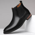 Men's black pointed toe Chelsea boots with artificial PU leather upper and decorative stitching