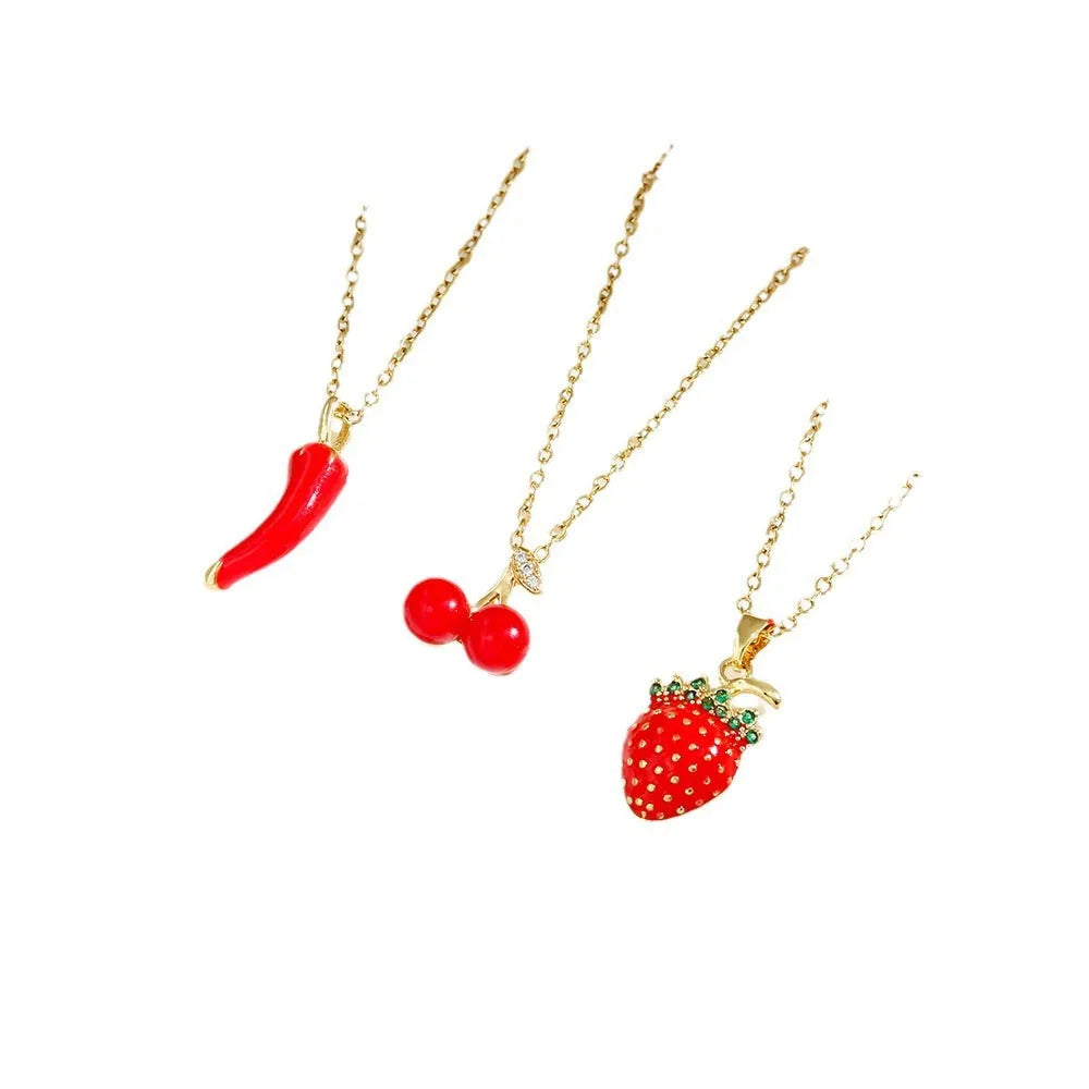 Delicate titanium steel necklace with a small cherry charm on an O-ring chain.