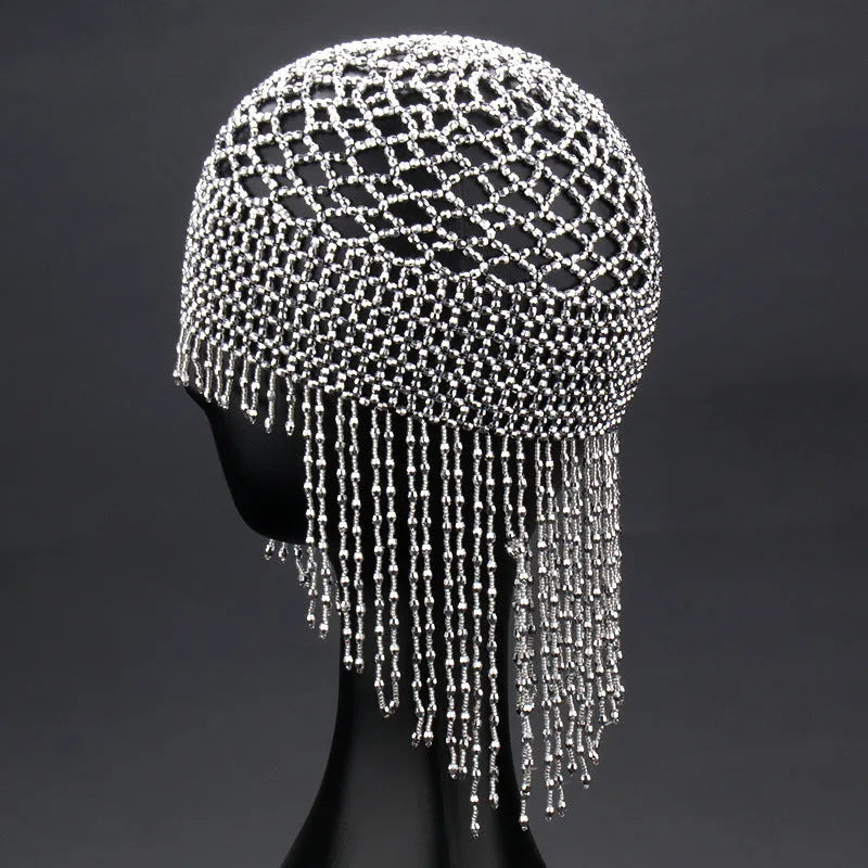 Handmade beaded belly dance hat with alloy construction and long tassels in black or silver