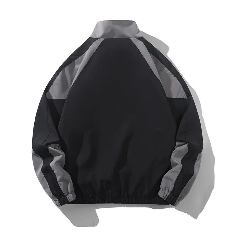 Men's black loose-fit casual jacket with contrast stitching and side pockets for spring and autumn.