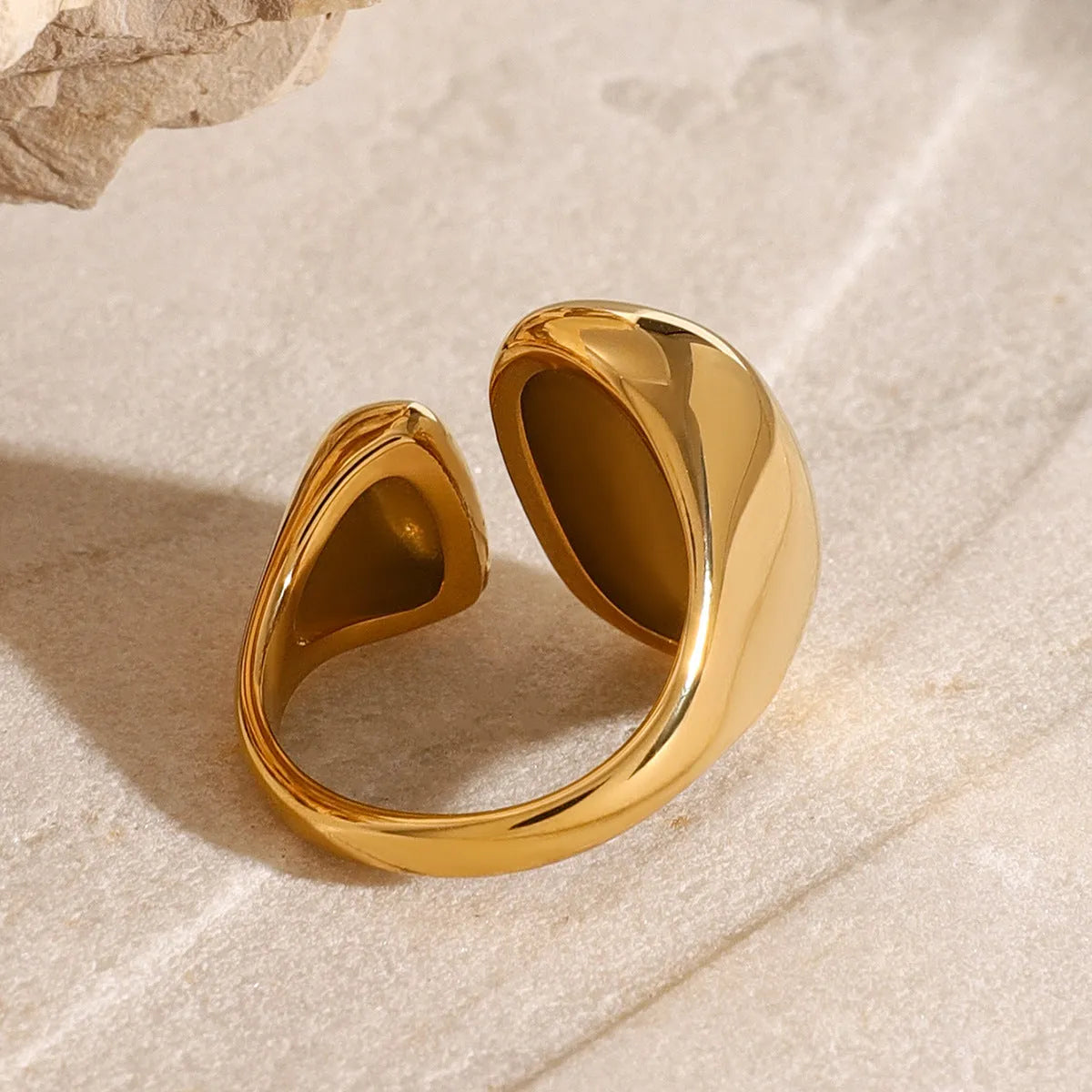 Women's exaggerated geometric stainless steel ring with electroplated finish