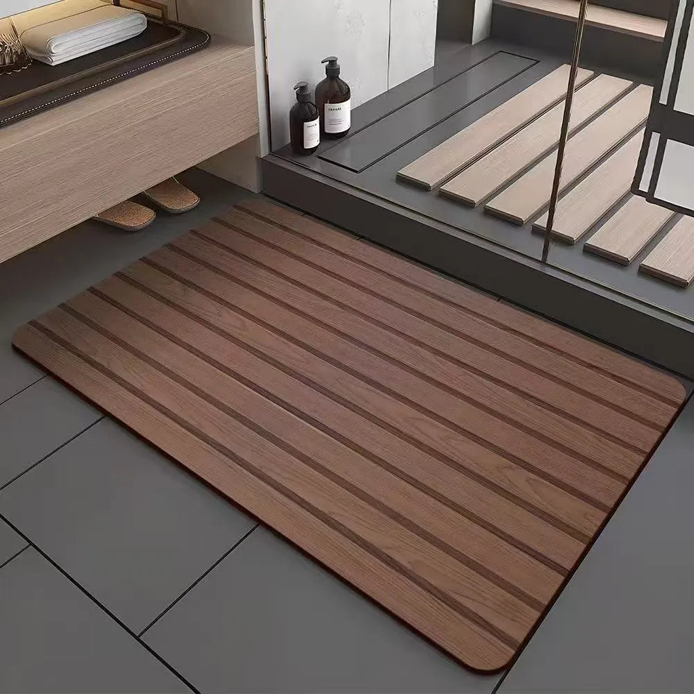 Square American-style diatom ooze floor mat with a geometric wood grain pattern in a bathroom setting.