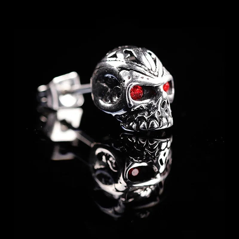 Retro skull stud earrings with red eye detailing and electroplated alloy construction
