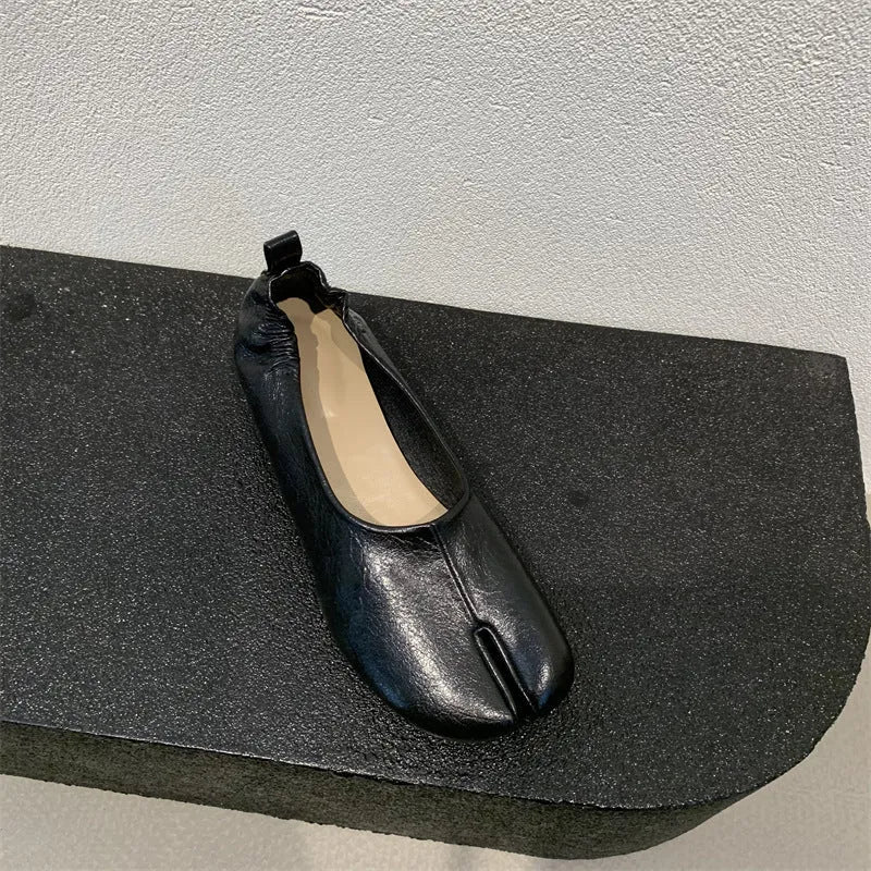 Women's apricot split toe chunky heel pumps with round toe and low heel on a white background.