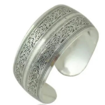 Ethnic carved open Miao silver bracelet with diamond treatment in Roman shape