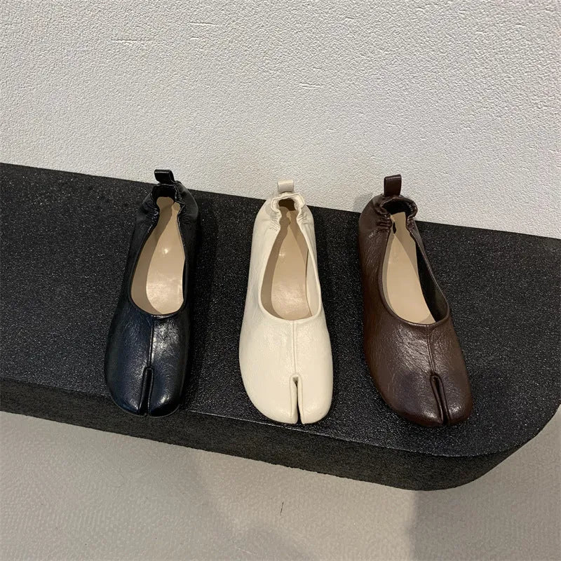 Women's apricot split toe chunky heel pumps with round toe and low heel on a white background.