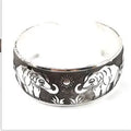 Ethnic carved open Miao silver bracelet with diamond treatment in Roman shape
