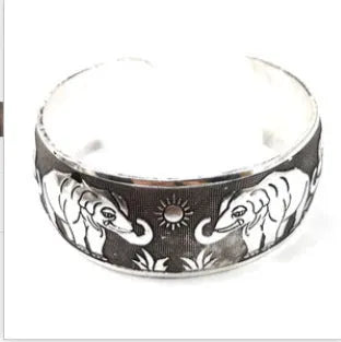 Ethnic carved open Miao silver bracelet with diamond treatment in Roman shape