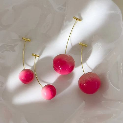 Acrylic peach fruit earrings for women in small and large peach colour variations