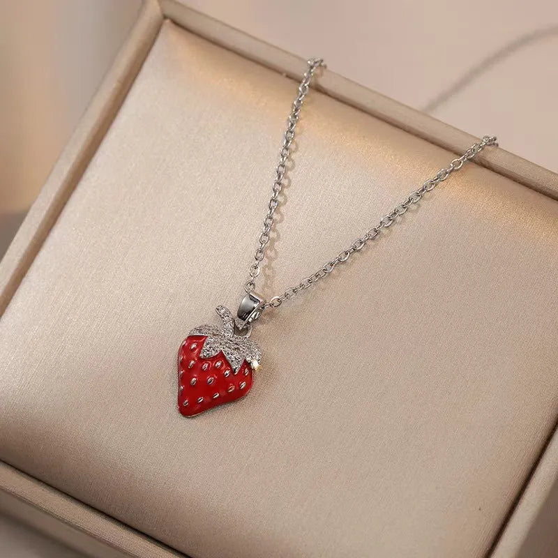 Delicate titanium steel necklace with a small cherry charm on an O-ring chain.