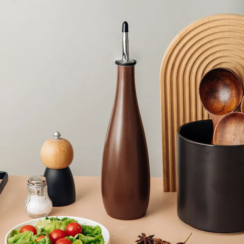 Ceramic oil pot with funnel for kitchen use in black, coffee, or white colour