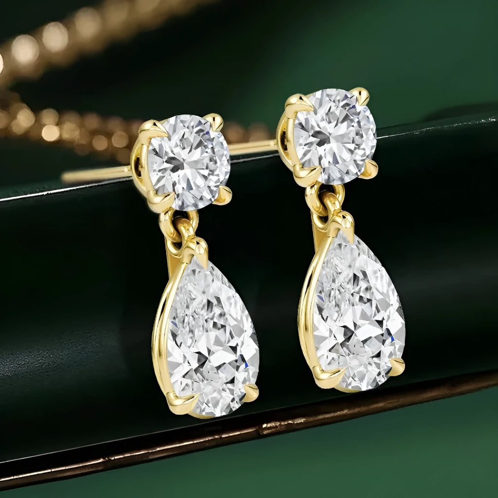 Sterling silver water drop moissanite stud earrings with geometric design in gold finish
