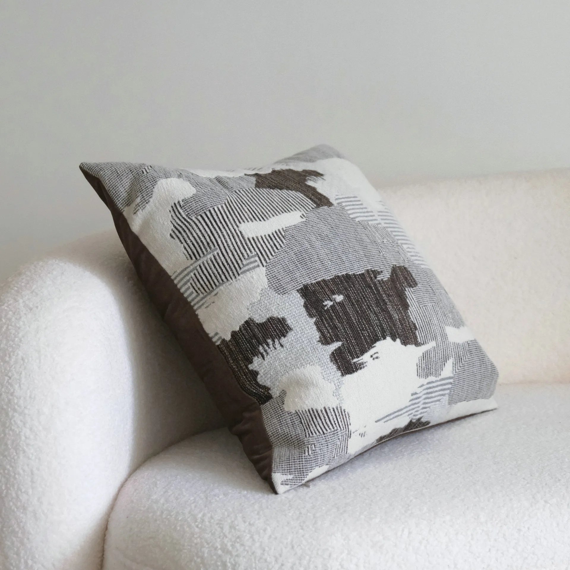 Coffee brown striped Chinese classical style pillow cushion on a sofa, shown in both square and waist pillow sizes.