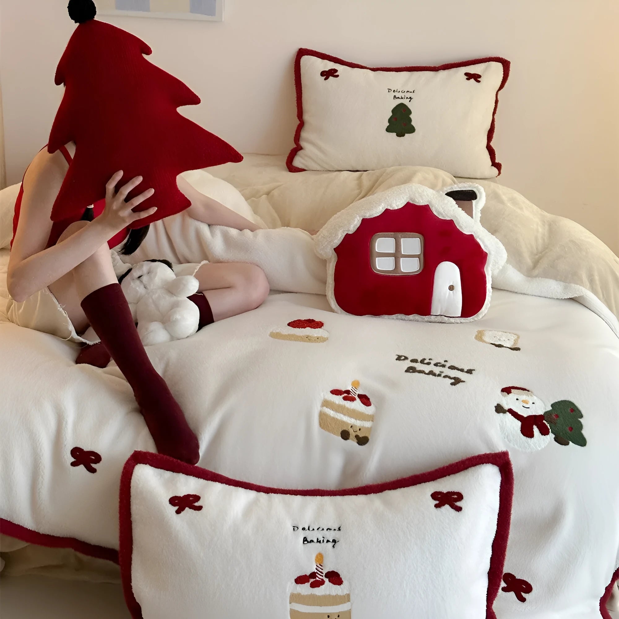 Cartoon pattern bedding four-piece set with winter Christmas design shown on bed