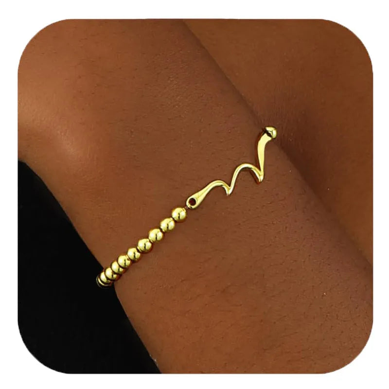 Adjustable stainless steel beaded bracelet for women in a geometric design with round beads.
