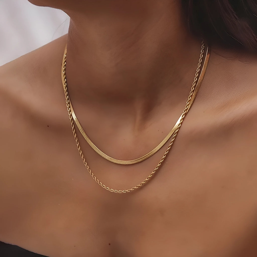 Women's retro geometric double-layer twist necklace in silver or gold tone on adjustable snake bones chain.