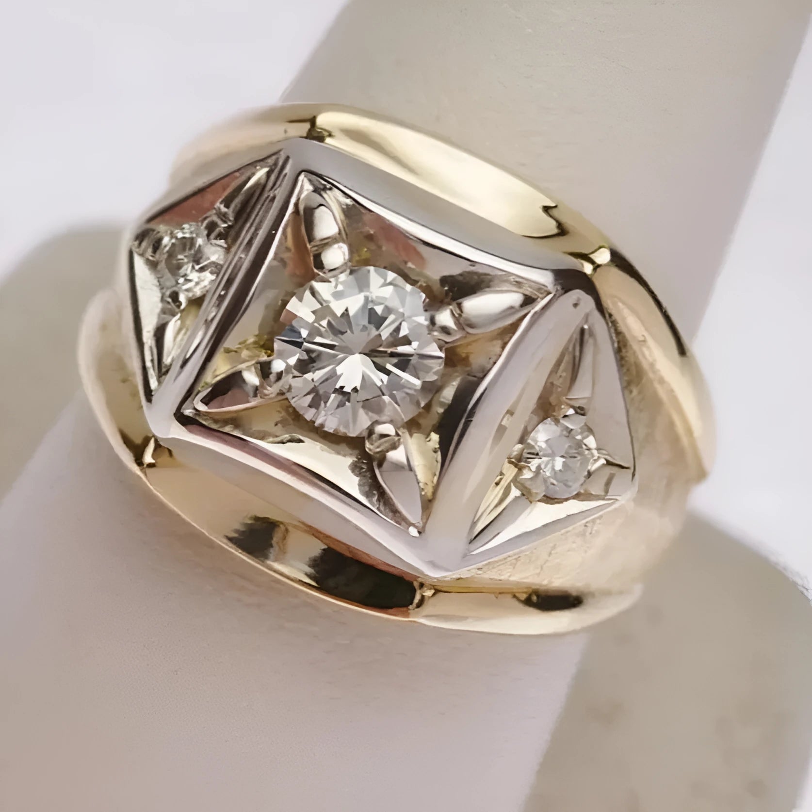 Gold-coloured geometric hollow copper couple rings with chamfered square pattern design