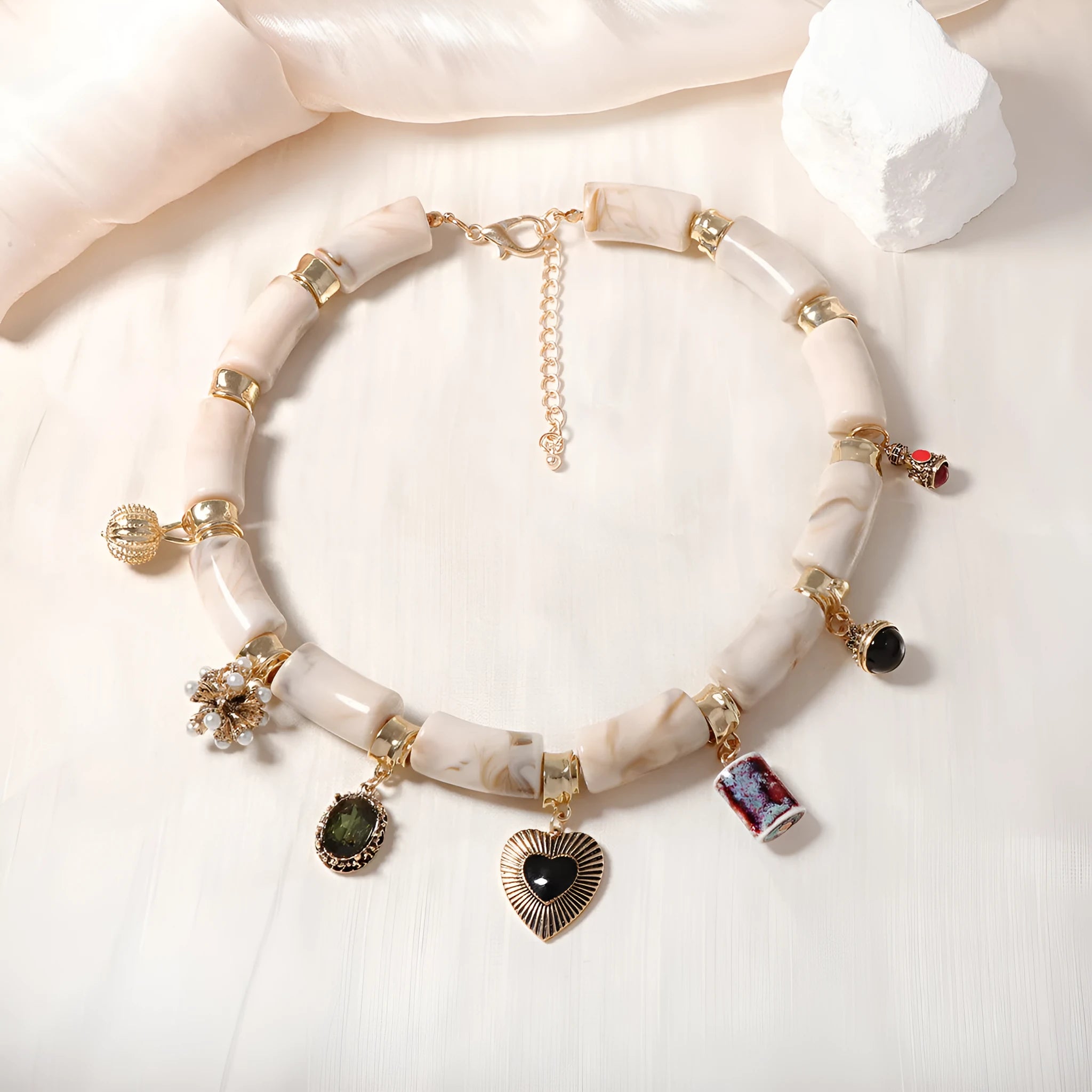 Heart-shaped bamboo resin pendant necklace with electroplated metallic finish