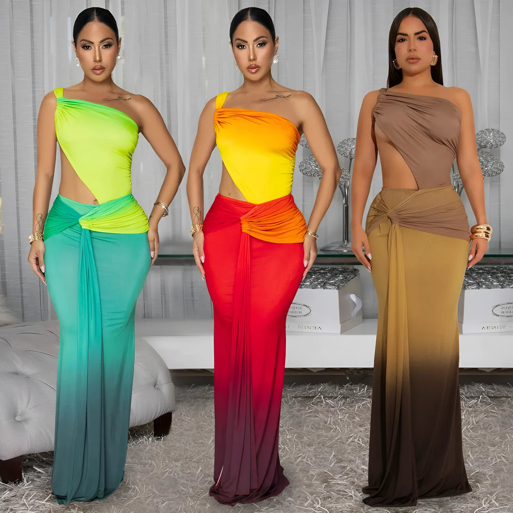 Long gradient-colour summer dress with oblique shoulder neckline and sleeveless design on a mannequin.
