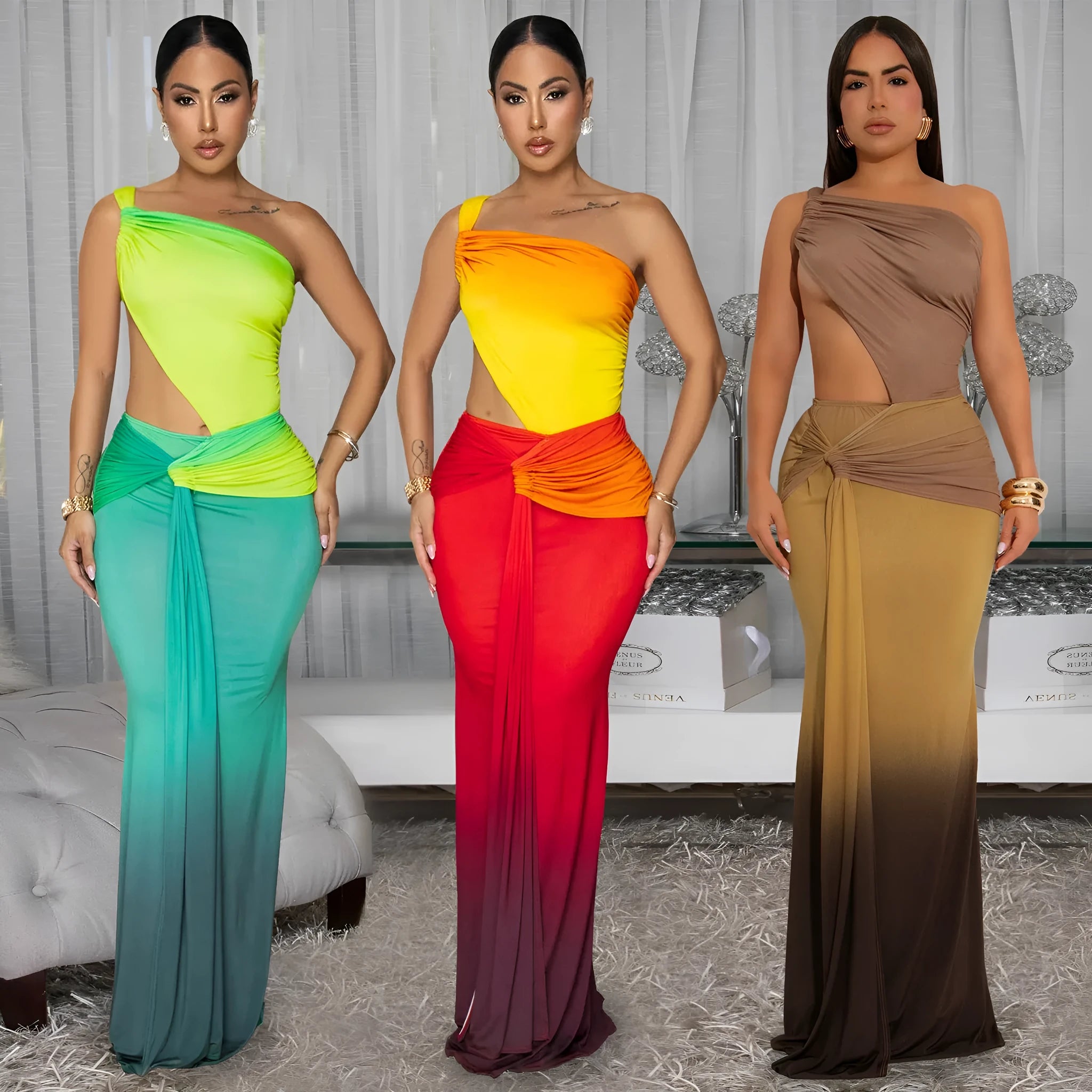Long gradient-colour summer dress with oblique shoulder neckline and sleeveless design on a mannequin.