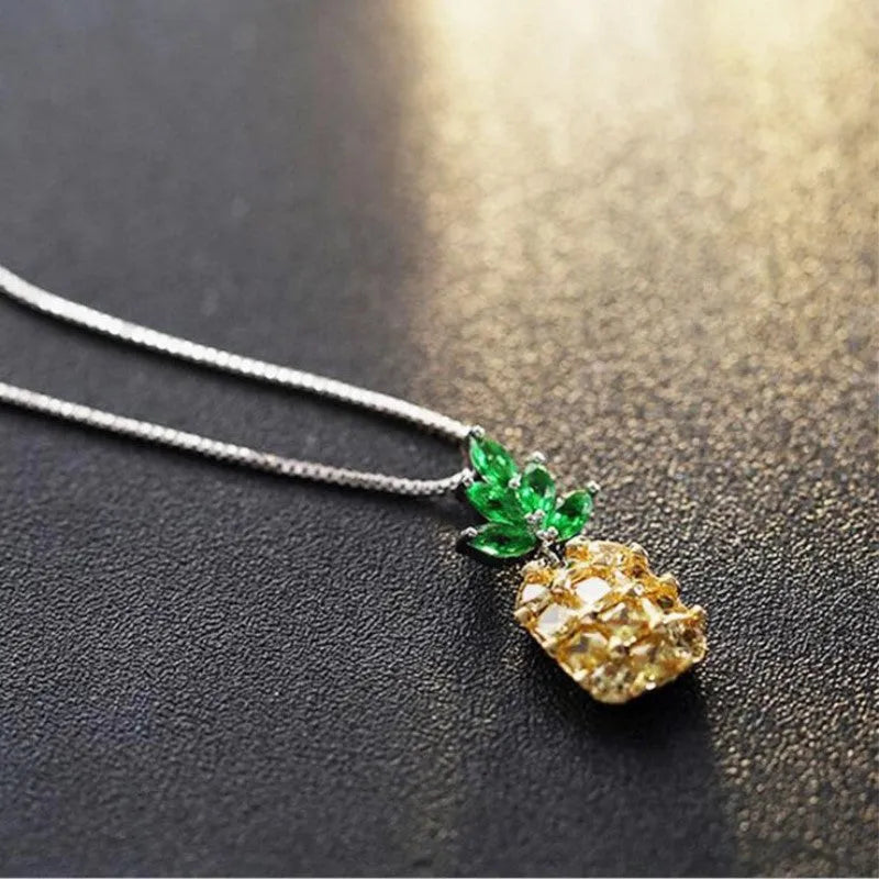 Women's geometric pineapple necklace with silver finish and detailed fruit charm