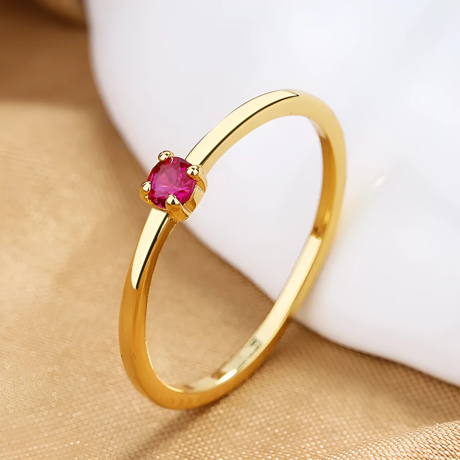 Copper geometric circle ring for women with a single diamond detail, shown in multiple colour options.