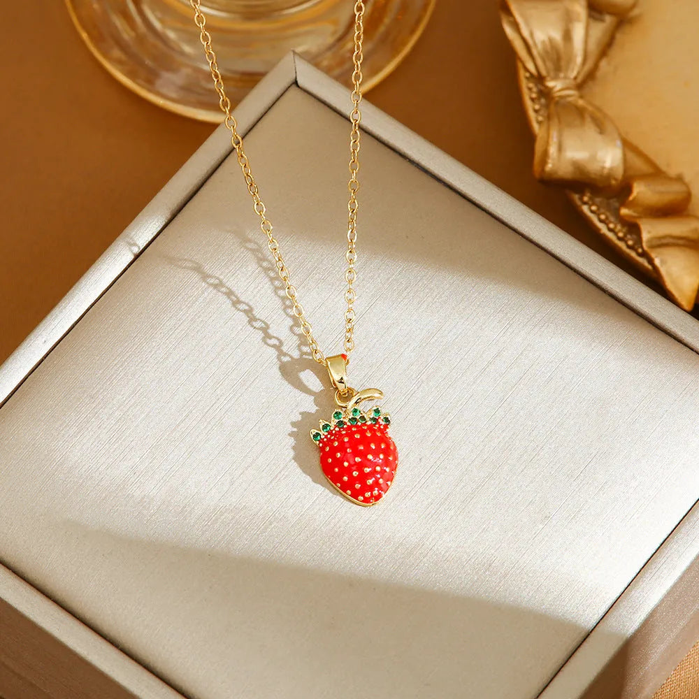 Delicate titanium steel necklace with a small cherry charm on an O-ring chain.