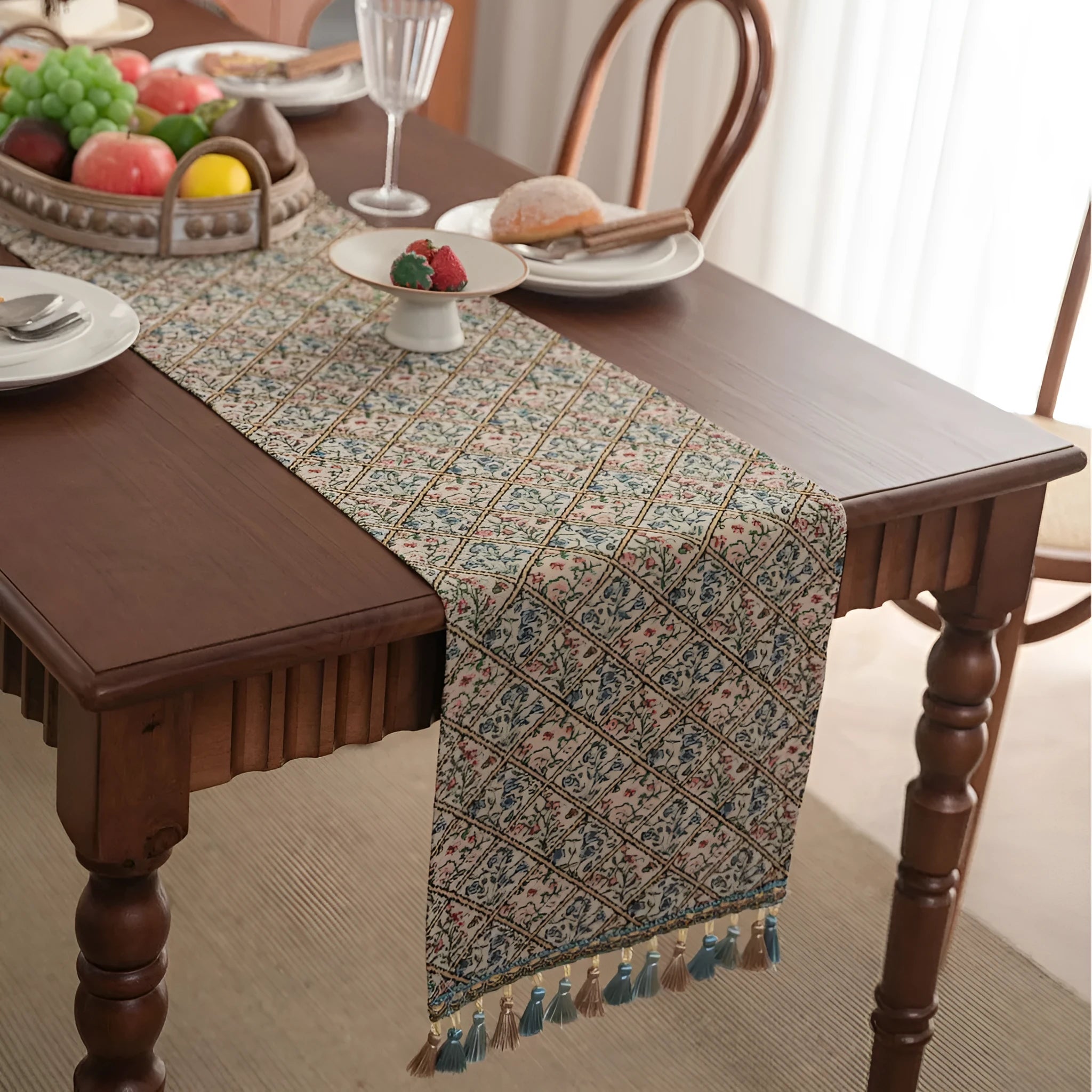 Dark blue Nordic jacquard table runner with bouquet pattern and tassel fringe on wooden table
