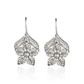 Women's retro simple hollow flower leaf-shaped earrings in silver alloy, a pair of drop earrings with hollow metal design