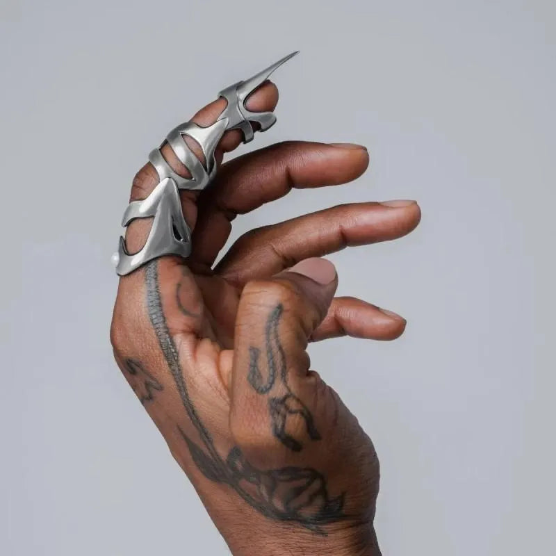 Silver punk armour fashion ring made from alloy, shown as a single finger cover.