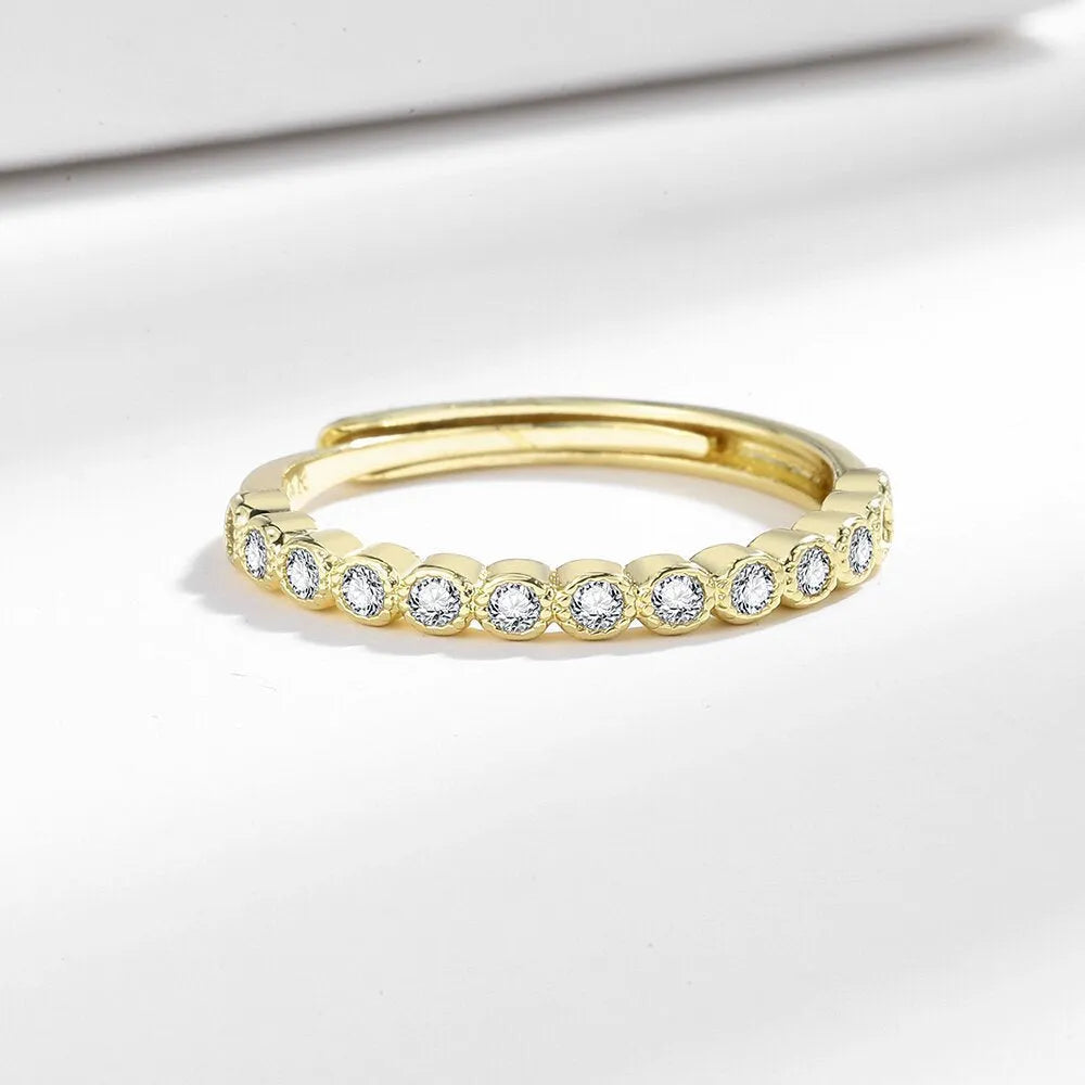 Geometric open mouth women's ring in gold colour on a copper base.