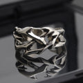 Copper thorn flower ring with geometric pattern and adjustable opening