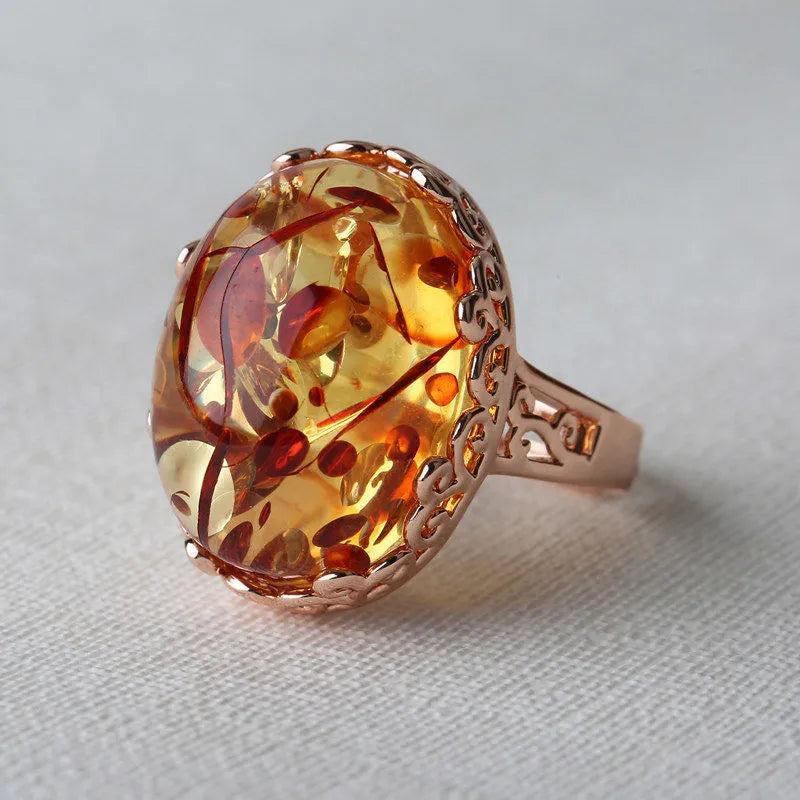 Beeswax Amber ring in New Amber Type A colour on an alloy base, ethnic retro style.