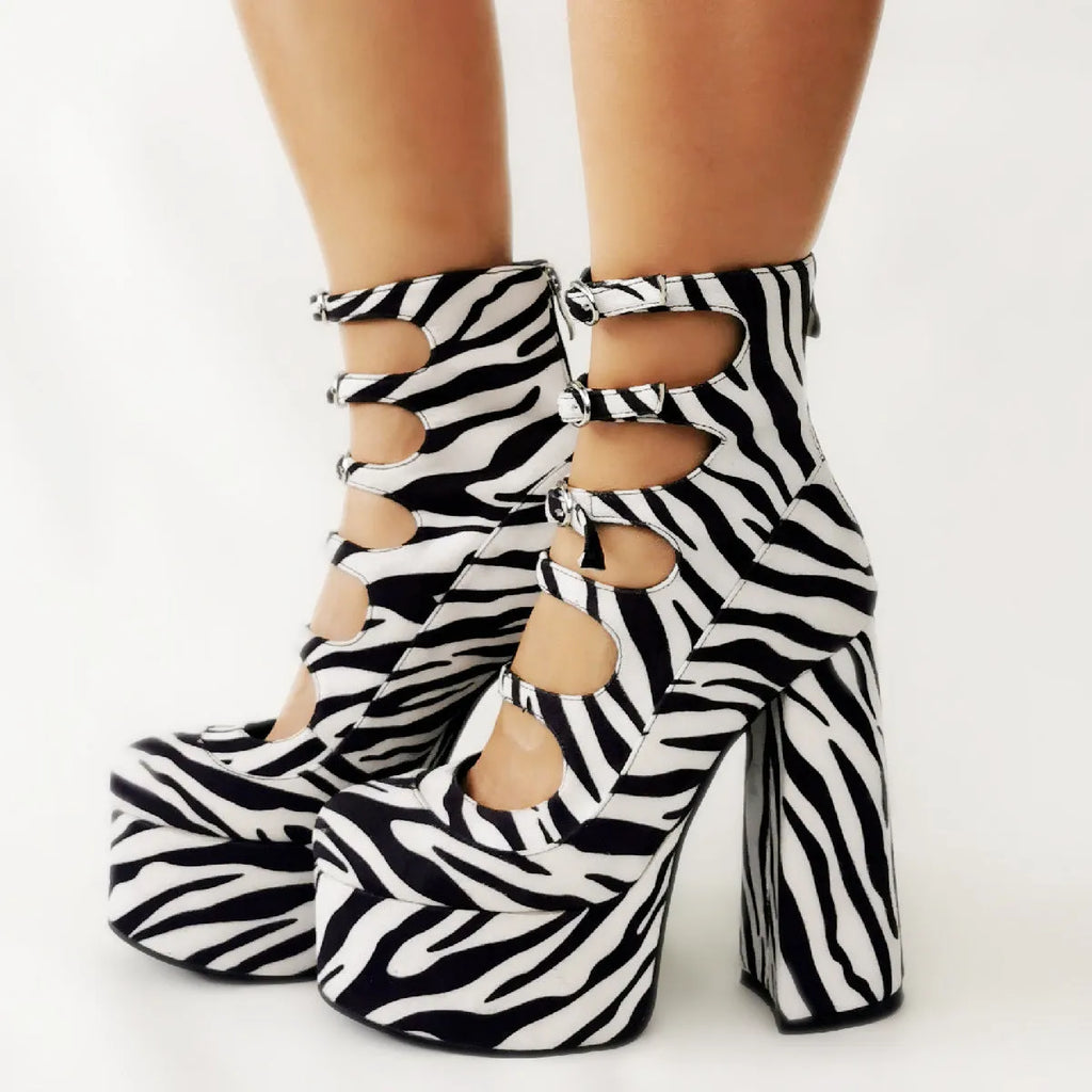Black patent leather women's platform high heels with a thick 8cm heel and a serpentine ankle buckle strap.