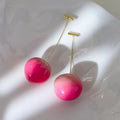 Acrylic peach fruit earrings for women in small and large peach colour variations