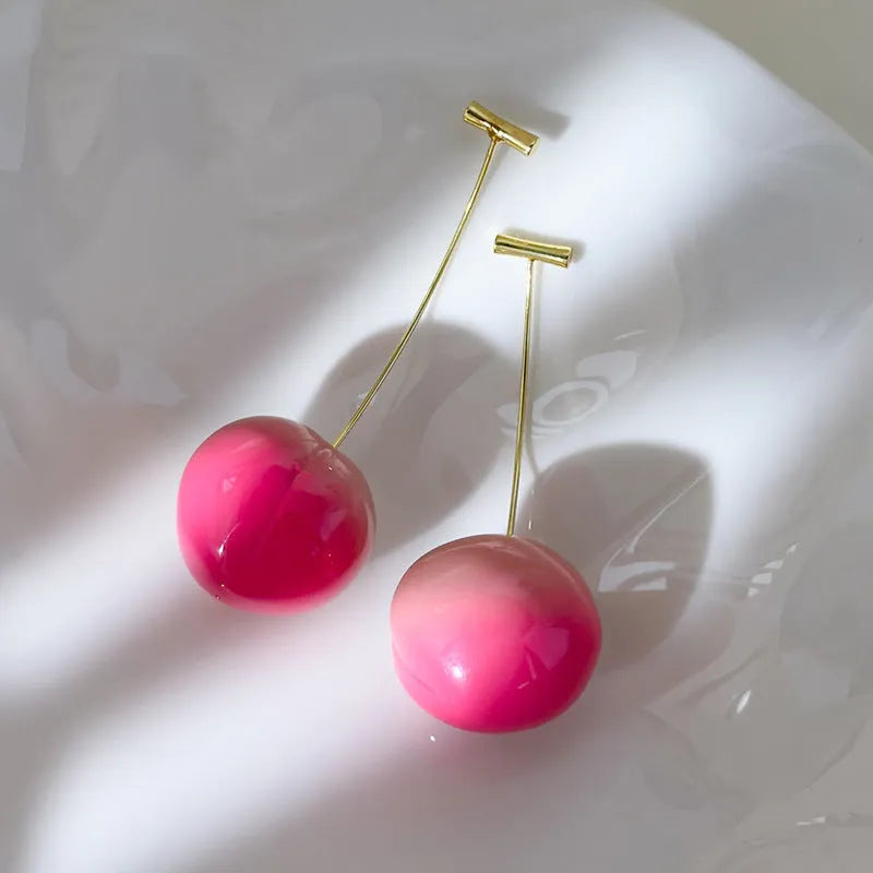 Acrylic peach fruit earrings for women in small and large peach colour variations