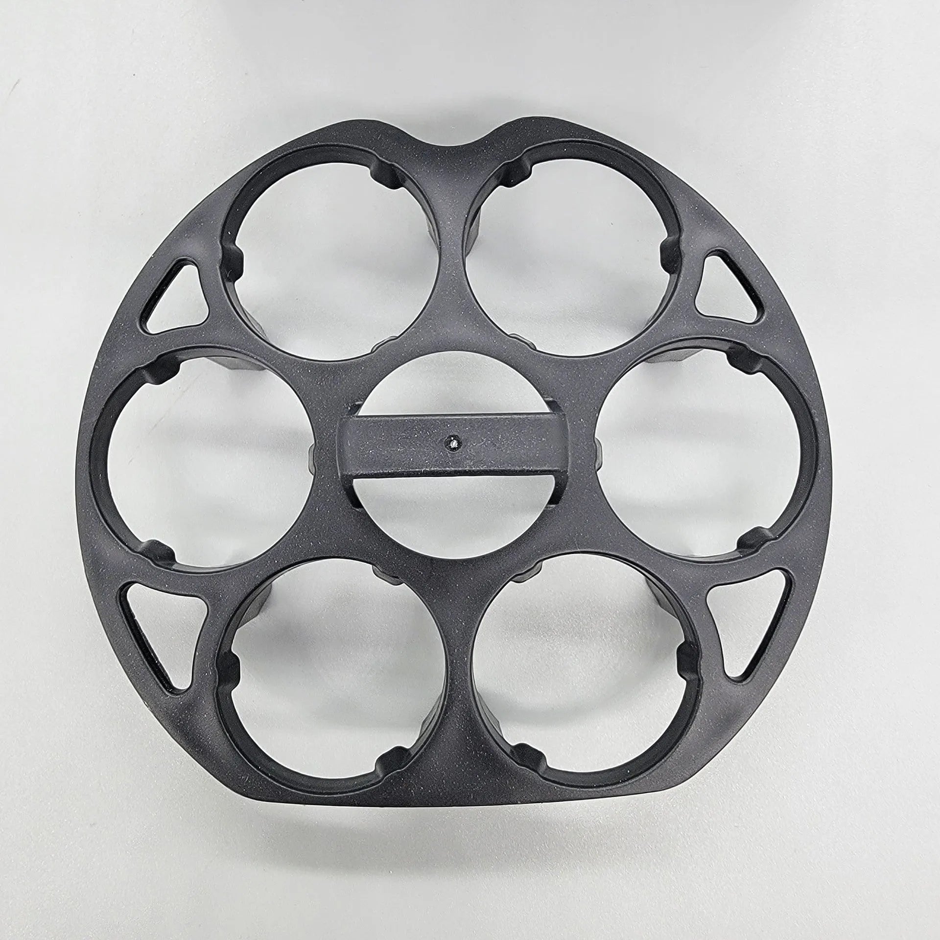 Black plastic egg holder rack with retainer basket design for kitchen organisation