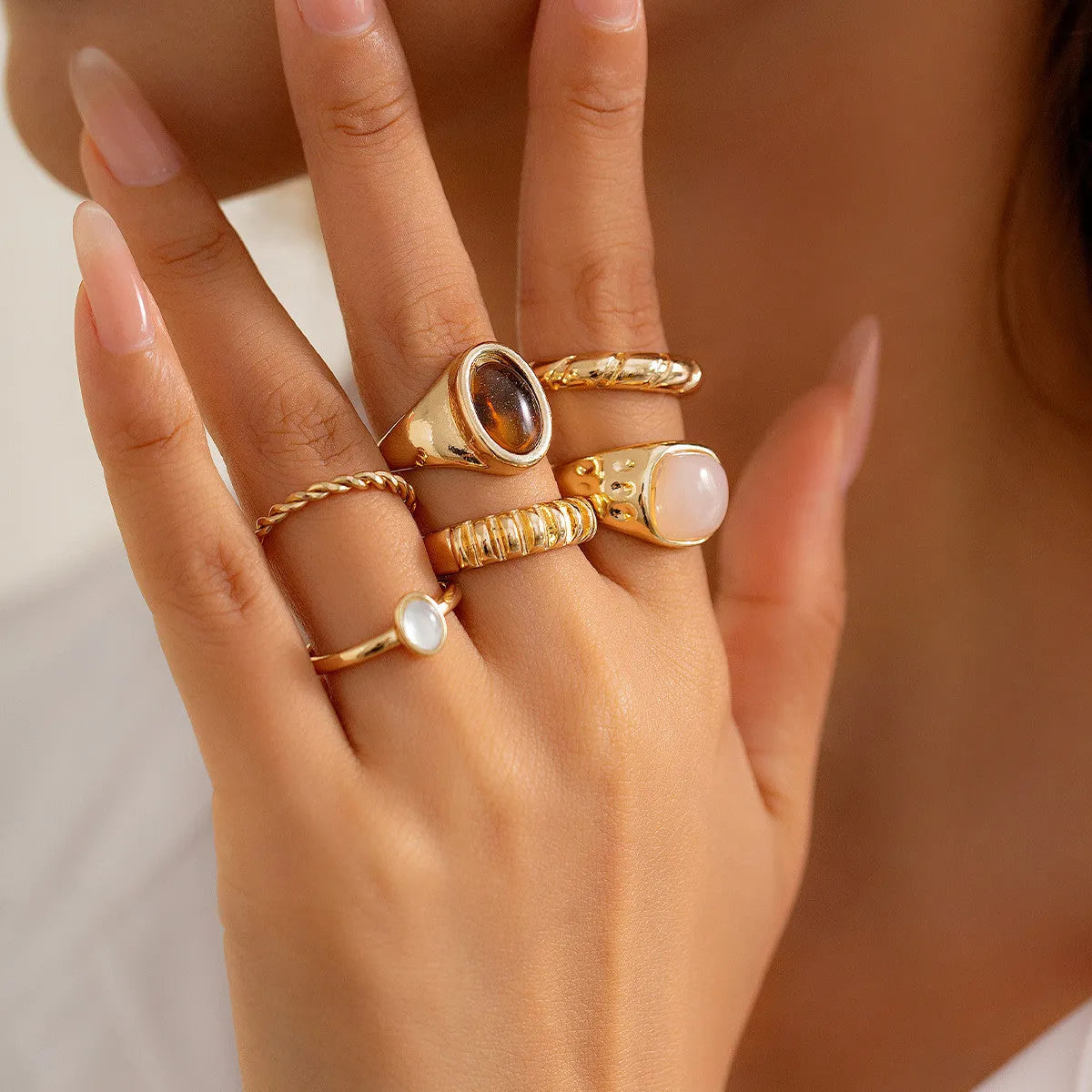 Light gold geometric irregular ring set with six different alloy rings